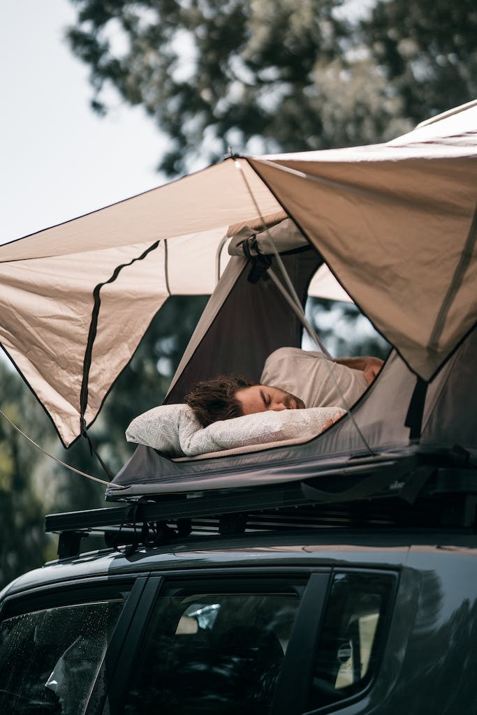 A Man Sleeping in a Tent